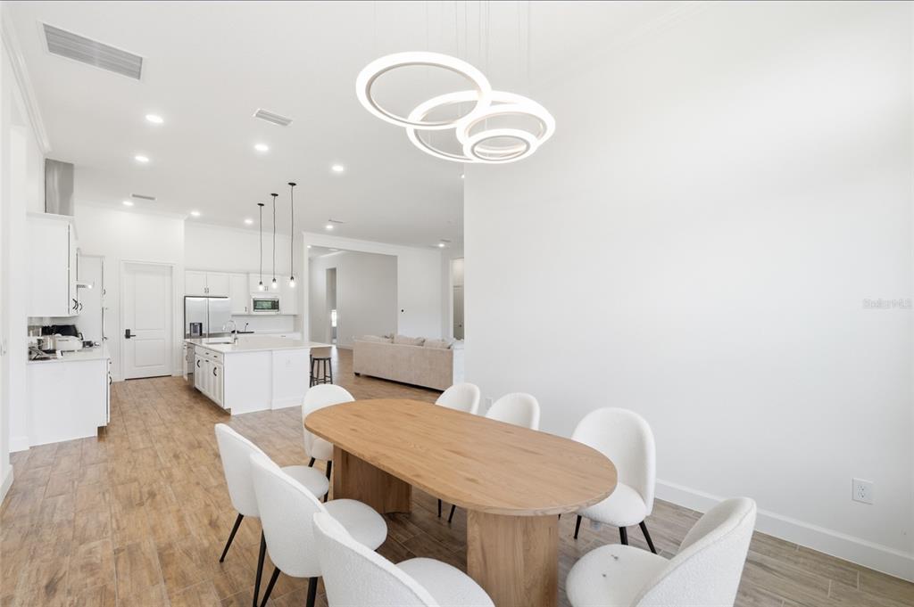 16071 Barkly Rdg Court Winter Garden, FL 34787 - Photo 11 of 31 a view of a dining room with furniture