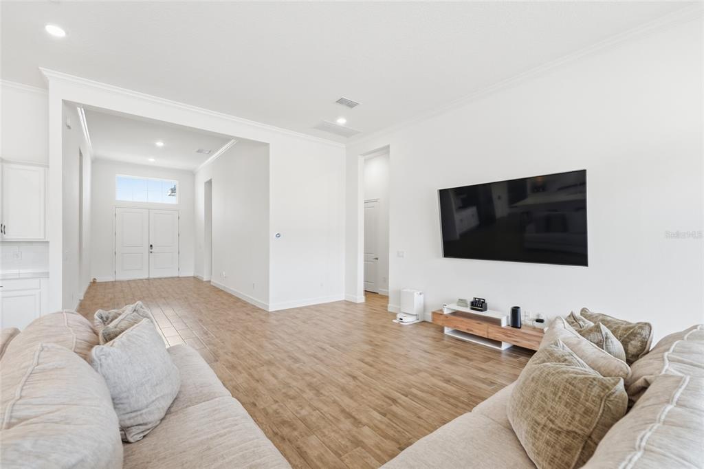 16071 Barkly Rdg Court Winter Garden, FL 34787 - Photo 17 of 31 a bedroom with a bed and a flat screen tv