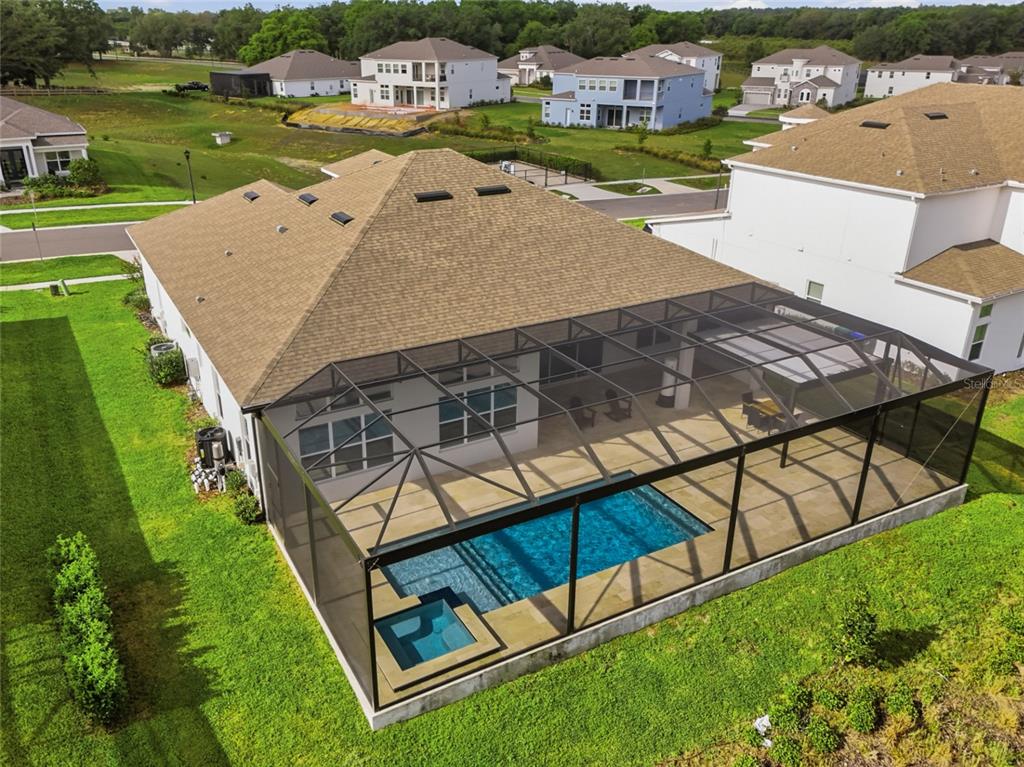 16071 Barkly Rdg Court Winter Garden, FL 34787 - Photo 2 of 31 an aerial view of a chairs and table on the patio