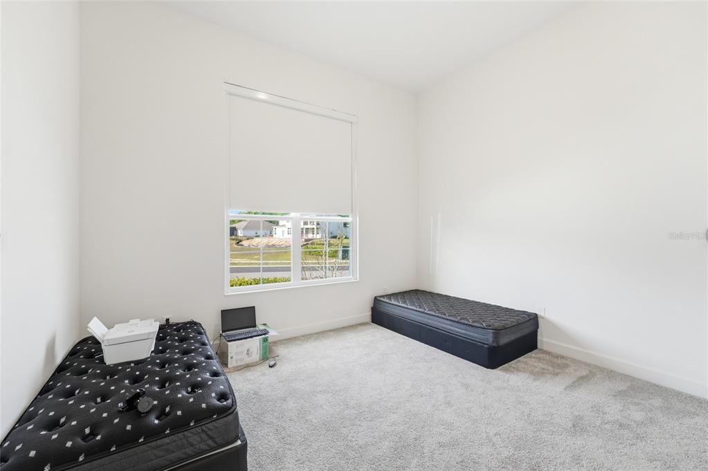 16071 Barkly Rdg Court Winter Garden, FL 34787 - Photo 23 of 31 a living room with furniture and a window