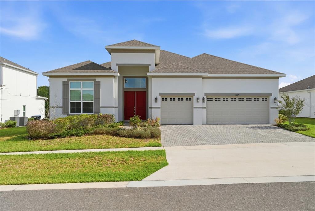 16071 Barkly Rdg Court Winter Garden, FL 34787 - Photo 31 of 31 a front view of a house with a yard