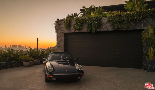 a car parked in front of a house