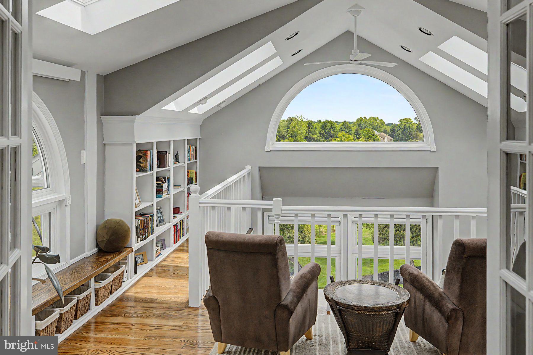 4009 Smoke Road Doylestown, PA 18902 - Photo 25 of 52 a living room with furniture a fireplace and a large window