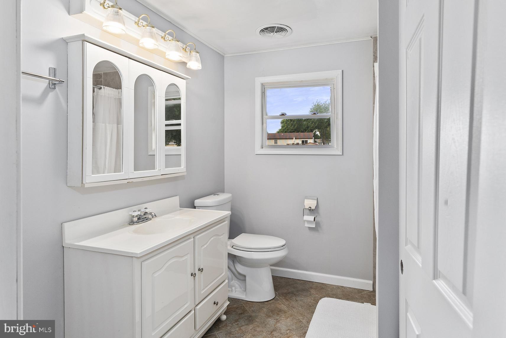 2701 Red Toad Road Rising Sun, MD 21911 - Photo 16 of 19 a bathroom with a sink and a toilet