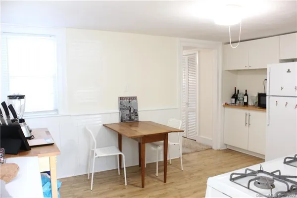 a view of a dining room with furniture