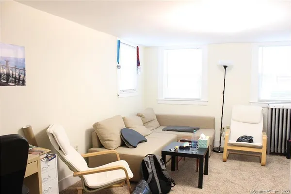 a view of a workspace with furniture