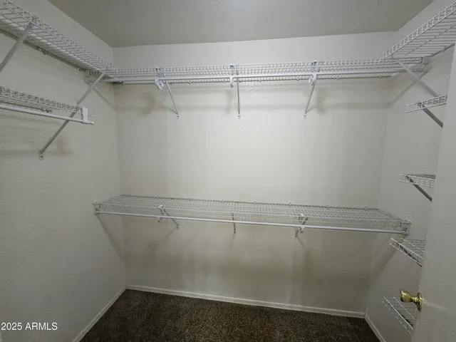 a view of a room with racks on the wall