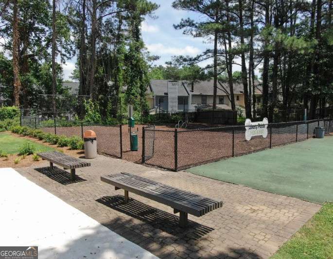 707 Franklin Road, Unit 1812 Marietta, GA 30067 - Photo 7 of 13 a view of a backyard with sitting area