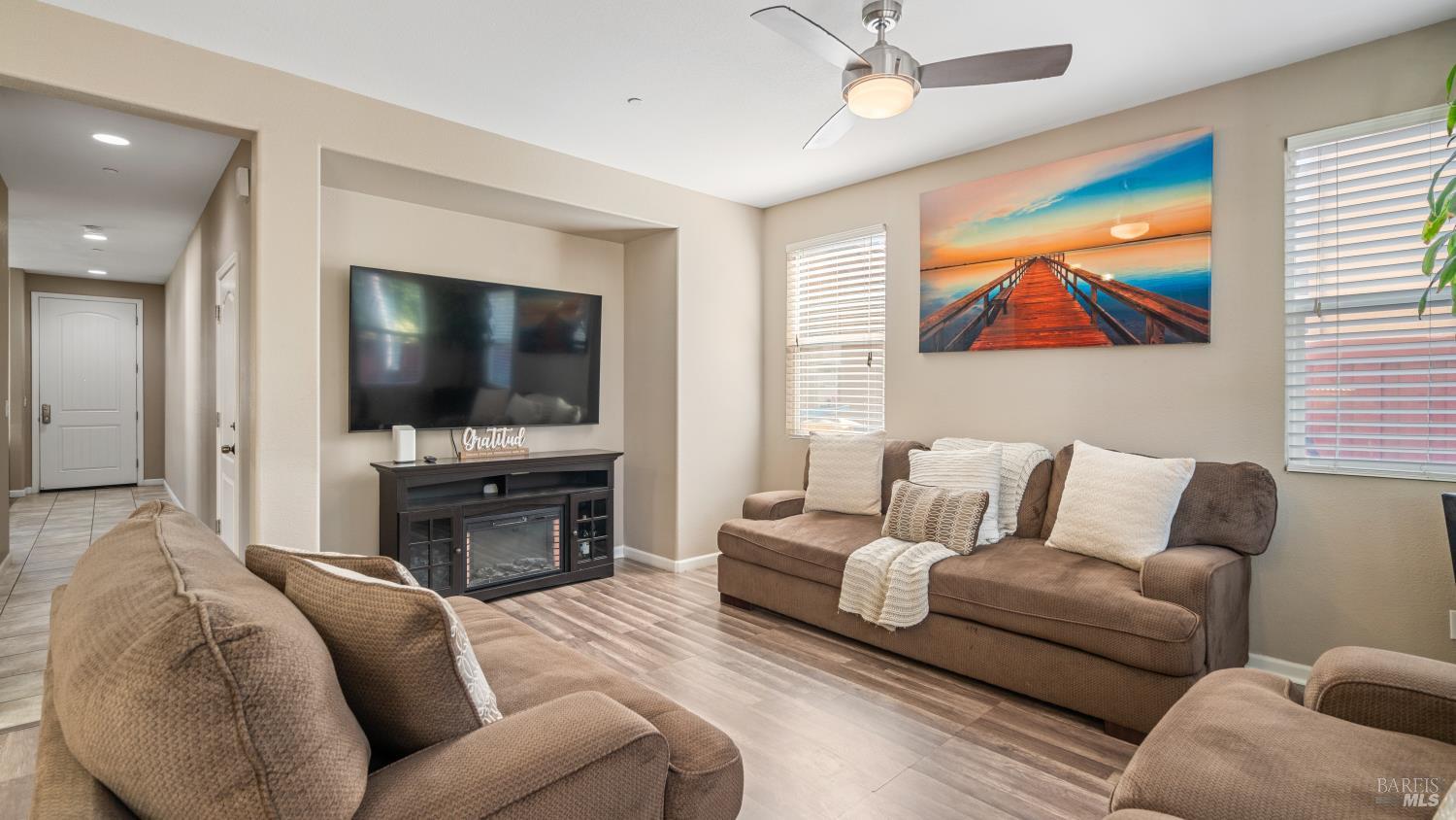 524 Chaparral Loop Vacaville, CA 95688 - Photo 12 of 43 a living room with furniture and a flat screen tv