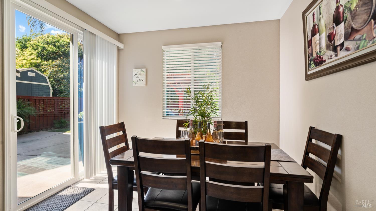 524 Chaparral Loop Vacaville, CA 95688 - Photo 16 of 43 a view of a dining room with furniture and a window