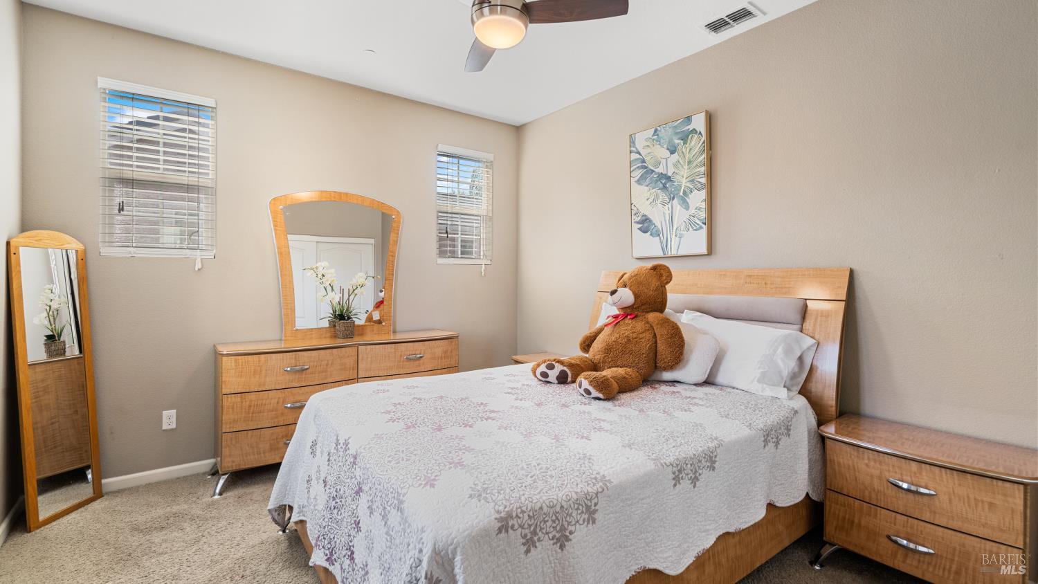 524 Chaparral Loop Vacaville, CA 95688 - Photo 20 of 43 a bedroom with a bed and wooden floor
