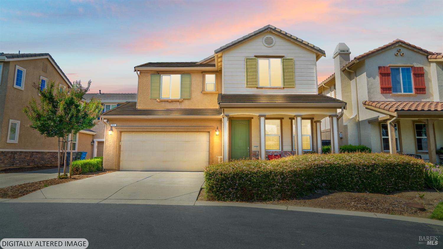524 Chaparral Loop Vacaville, CA 95688 - Photo 2 of 43 a front view of a house with a yard and garage