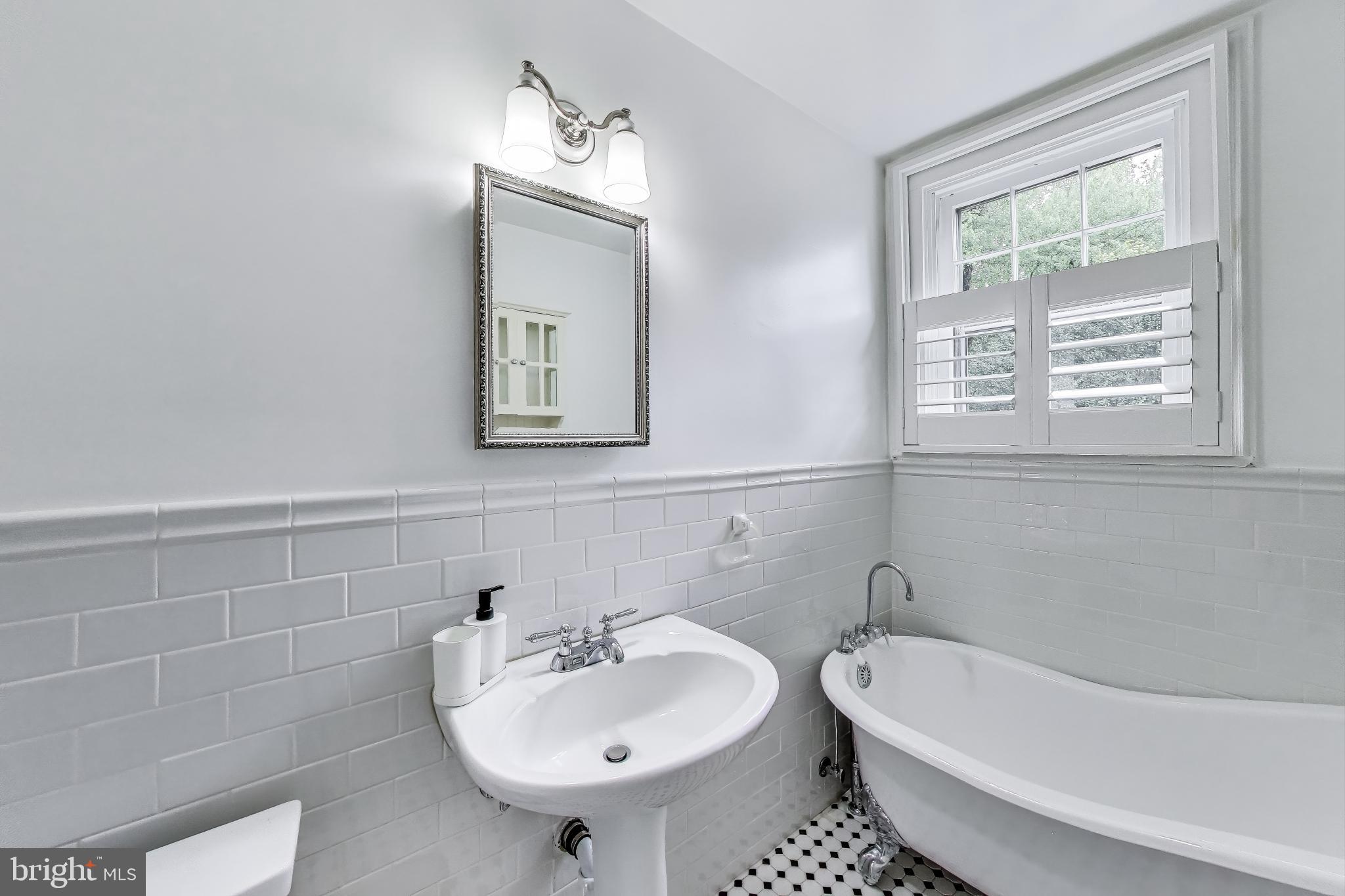 5809 Grosvenor Lane Bethesda, MD 20814 - Photo 28 of 41 Hall Bath 4 with Clawfoot Tub