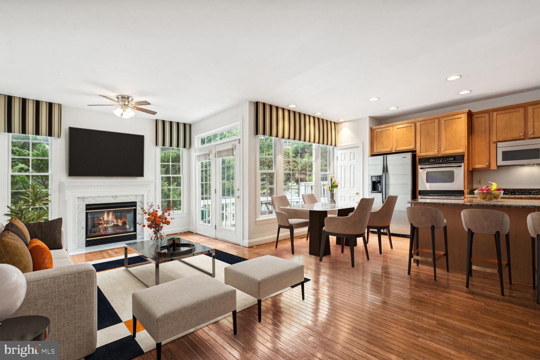 5410 Edsall Ridge Place Alexandria, VA 22312 - Photo 7 of 50 Family room off kitchen *Virtually Staged