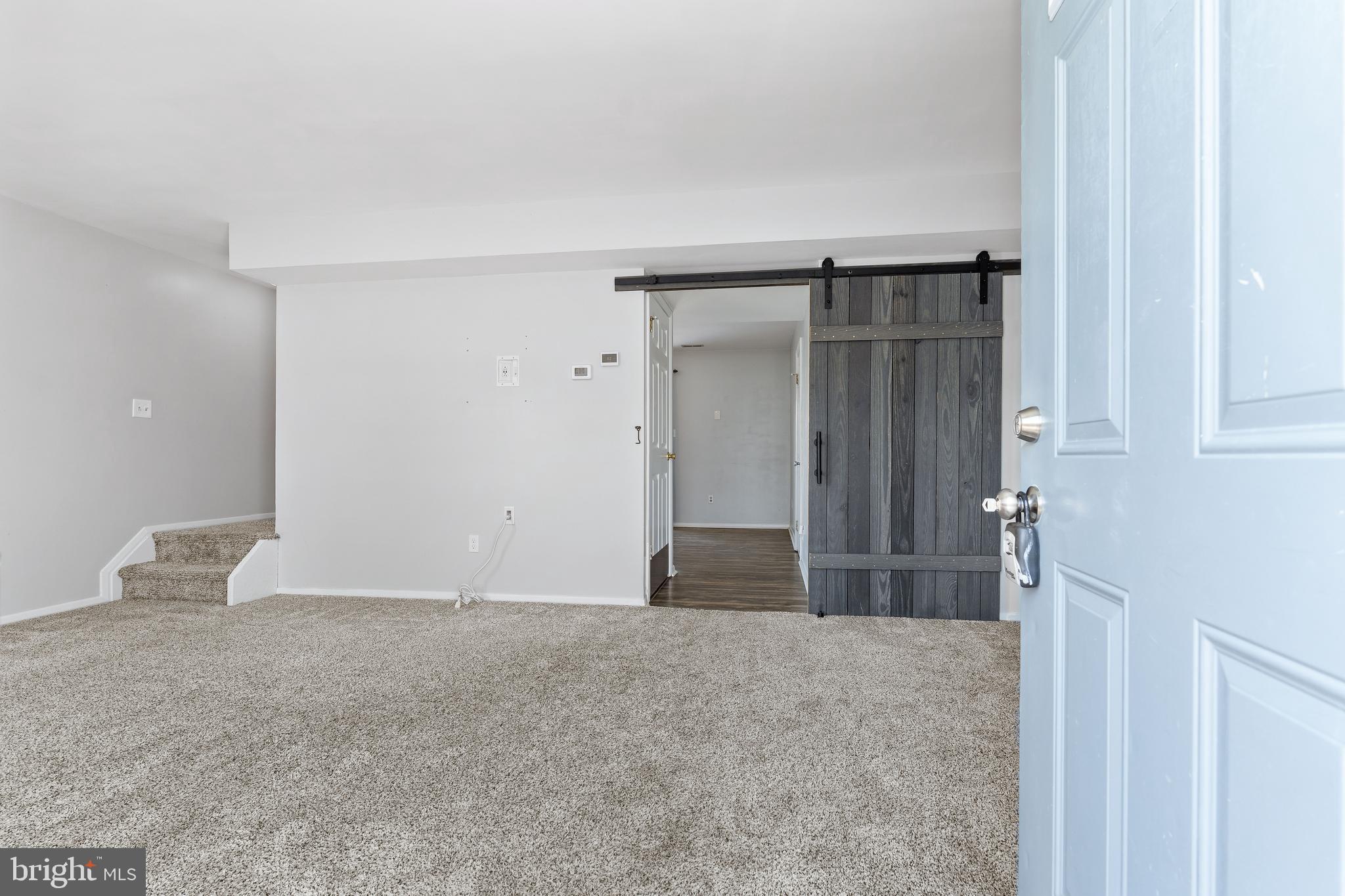 15 Anchor Court Perryville, MD 21903 - Photo 5 of 21 Living room w/barn door to kitchen