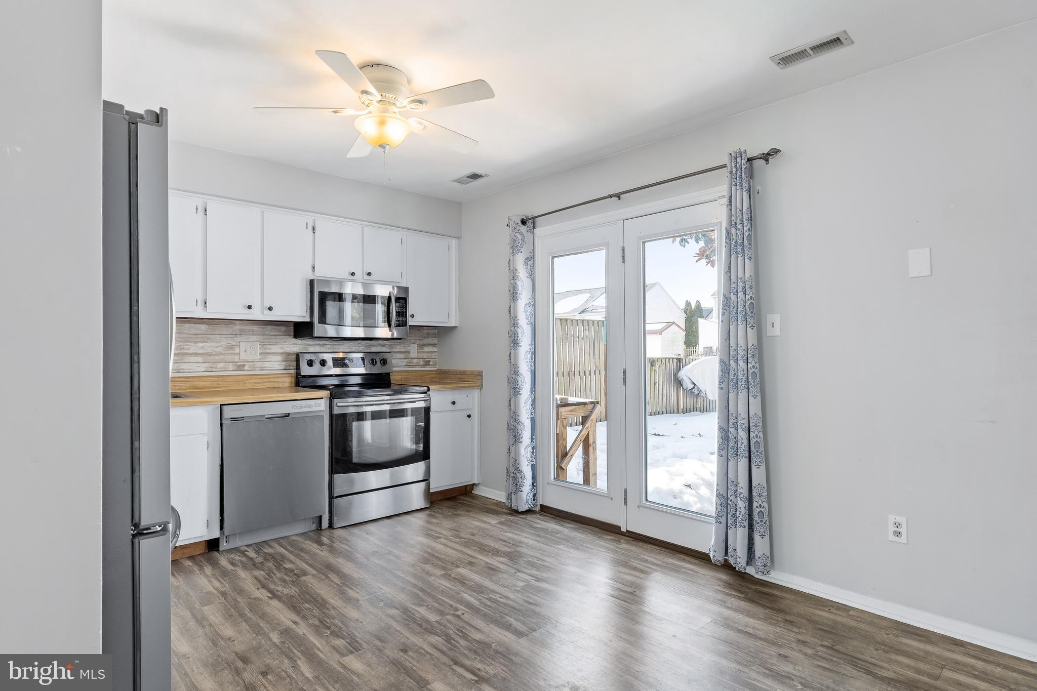 15 Anchor Court Perryville, MD 21903 - Photo 8 of 21 Kitchen with sliders to fenced back yard.