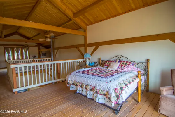 a view of balcony with furniture