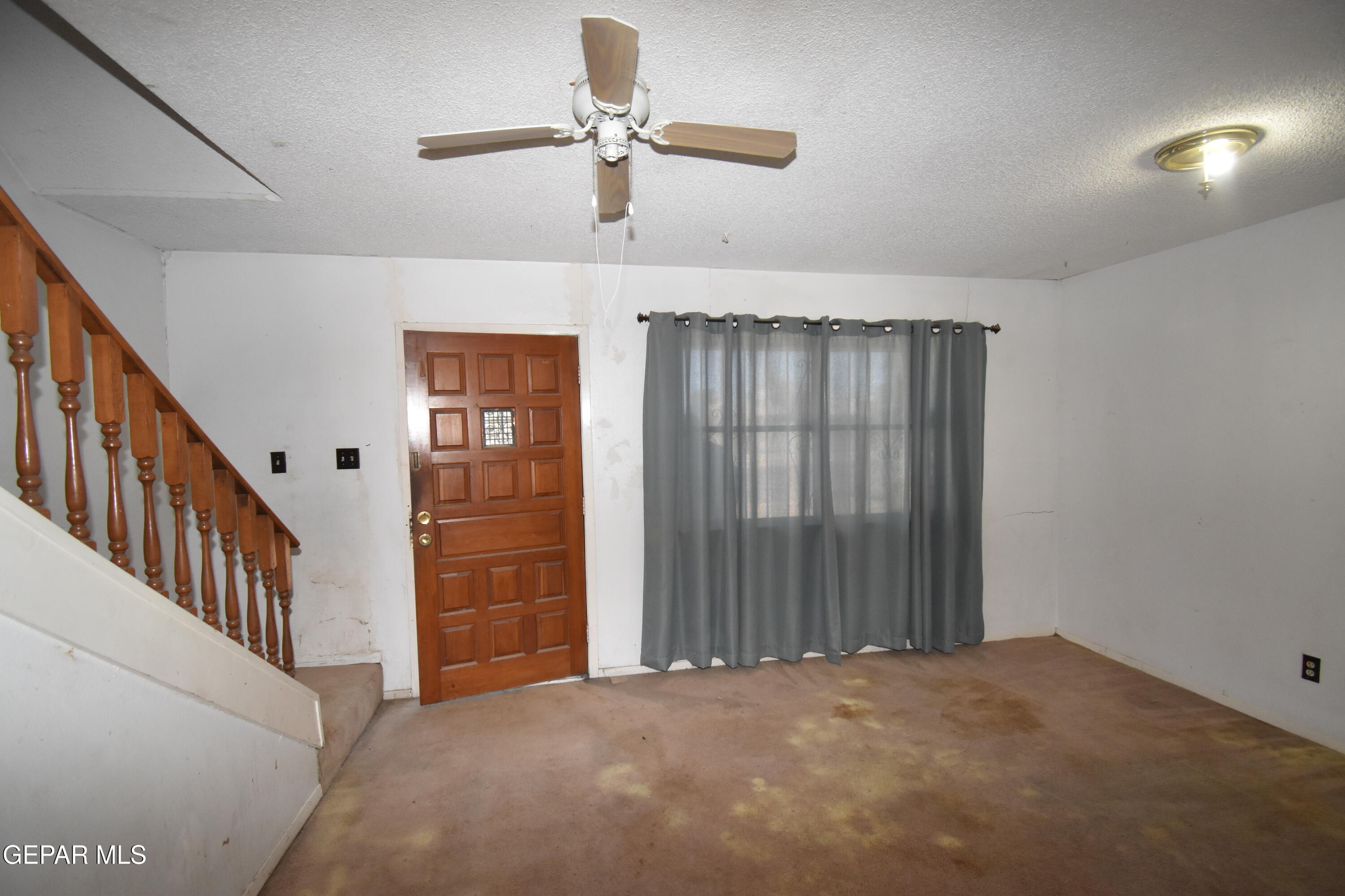 182 Prado Road El Paso, TX 79907 - Photo 6 of 19 a view of an empty room with a window