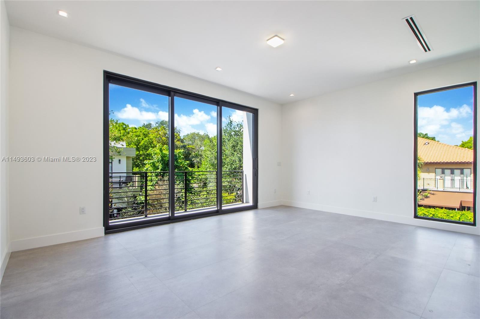 3242 Day Avenue Miami, FL 33133 - Photo 19 of 35 a view of an empty room with a window