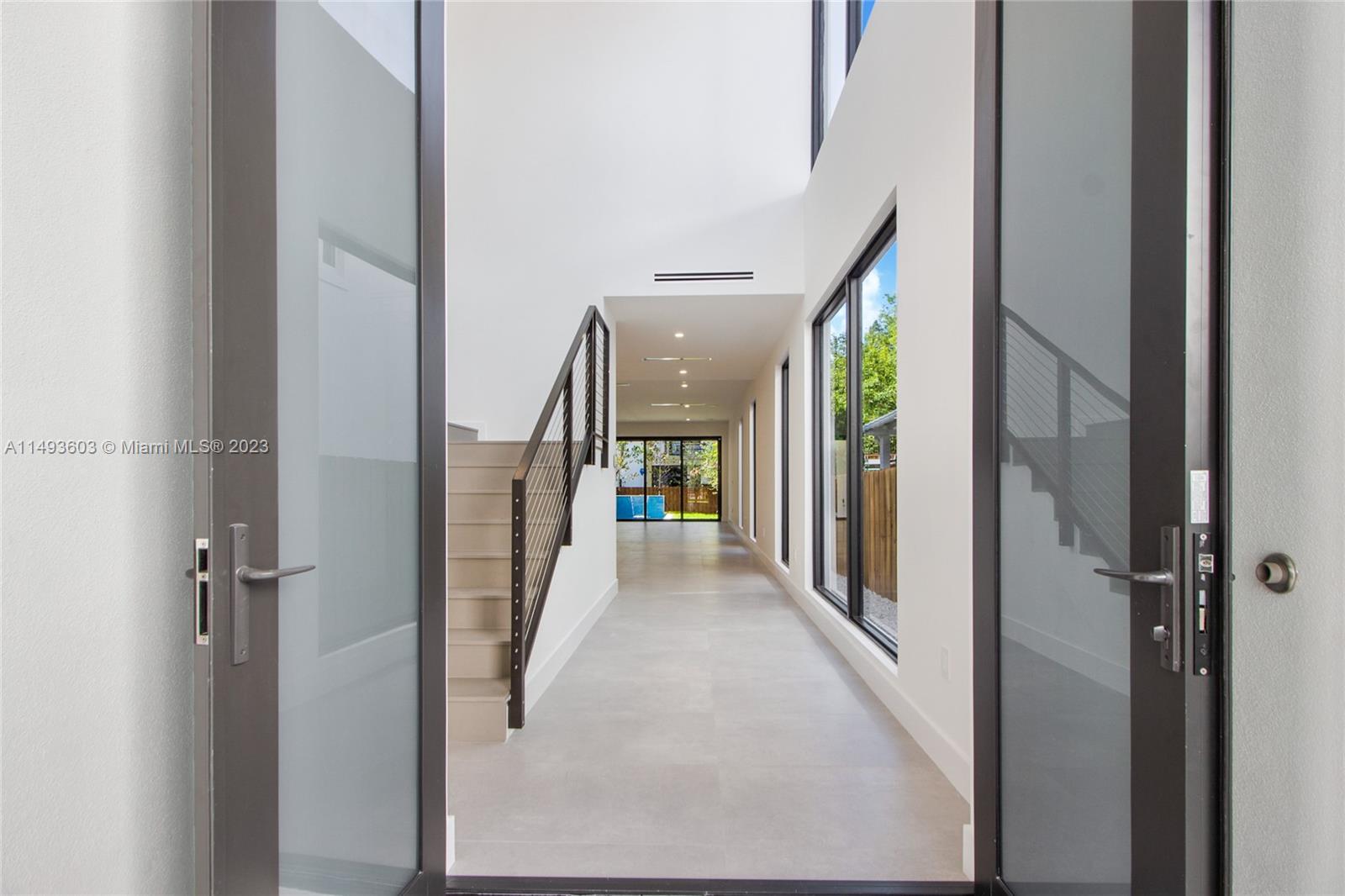 3242 Day Avenue Miami, FL 33133 - Photo 2 of 35 a view of a hallway view with staircase