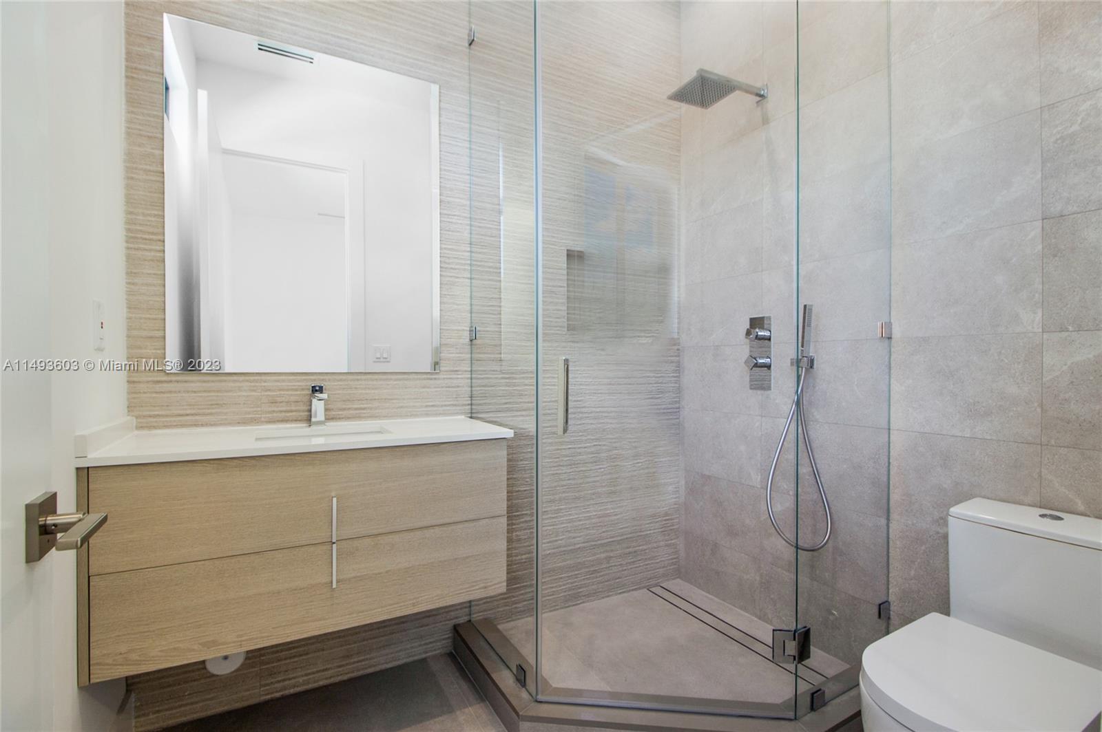 3242 Day Avenue Miami, FL 33133 - Photo 26 of 35 a bathroom with a sink toilet and shower