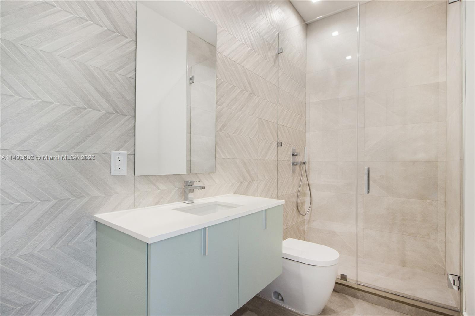 3242 Day Avenue Miami, FL 33133 - Photo 27 of 35 a bathroom with a sink toilet and shower