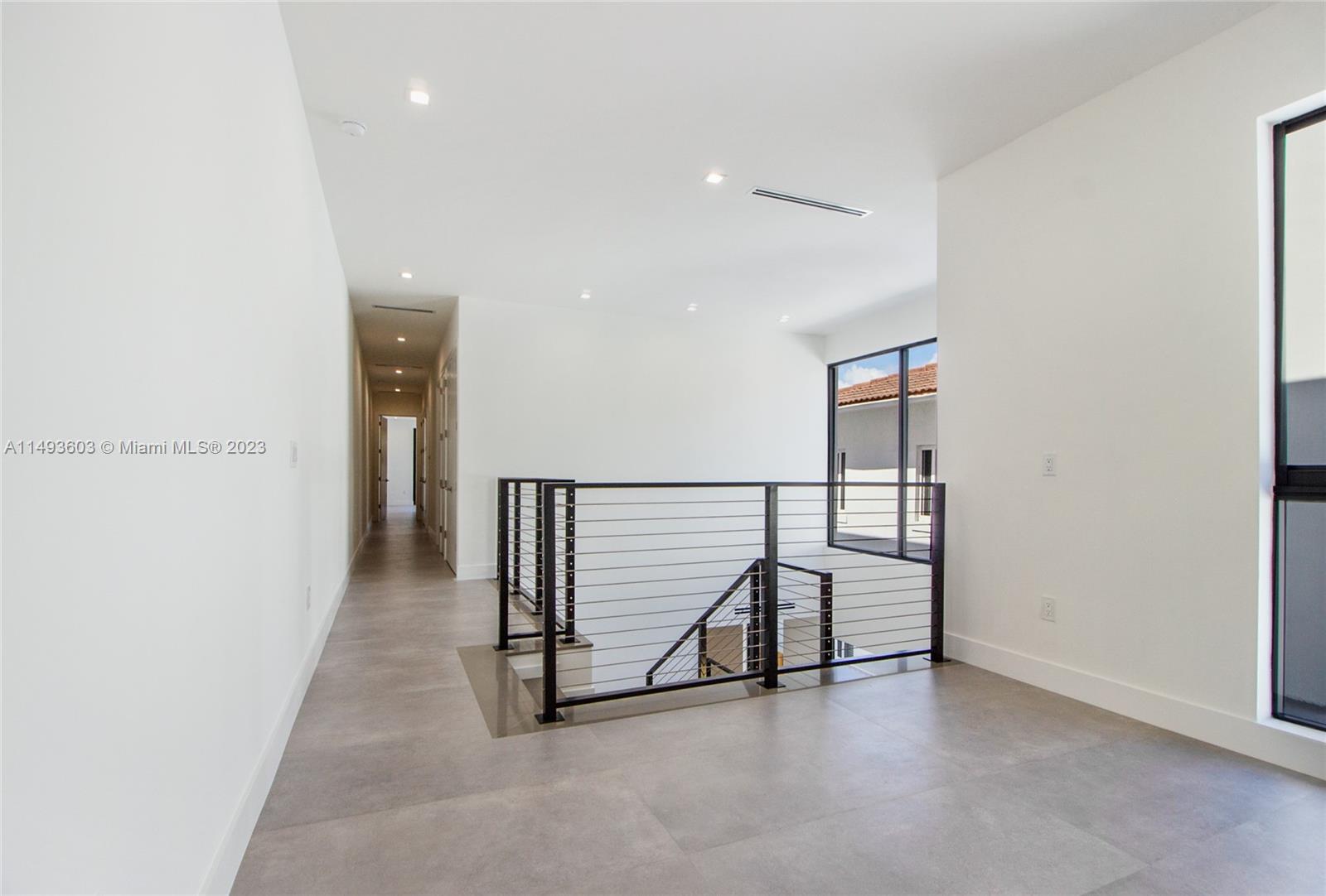 3242 Day Avenue Miami, FL 33133 - Photo 29 of 35 a view of hallway with stairs