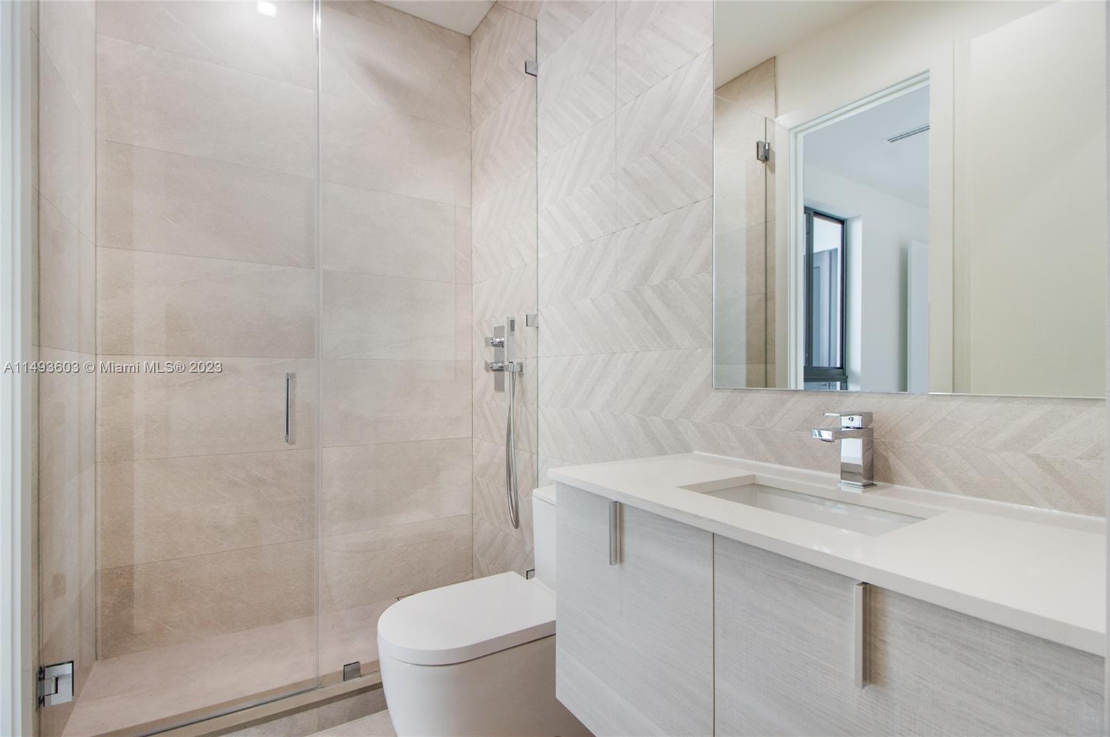 3242 Day Avenue Miami, FL 33133 - Photo 31 of 35 a bathroom with a sink toilet and shower