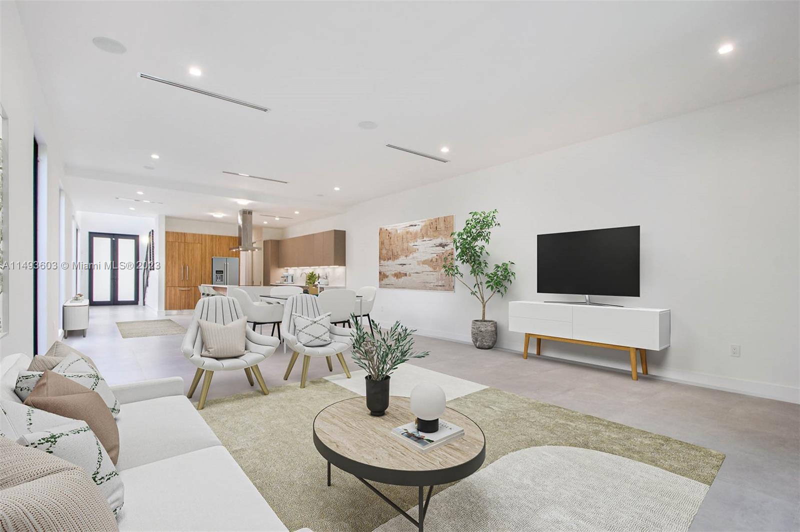 3242 Day Avenue Miami, FL 33133 - Photo 8 of 35 a living room with furniture and a flat screen tv