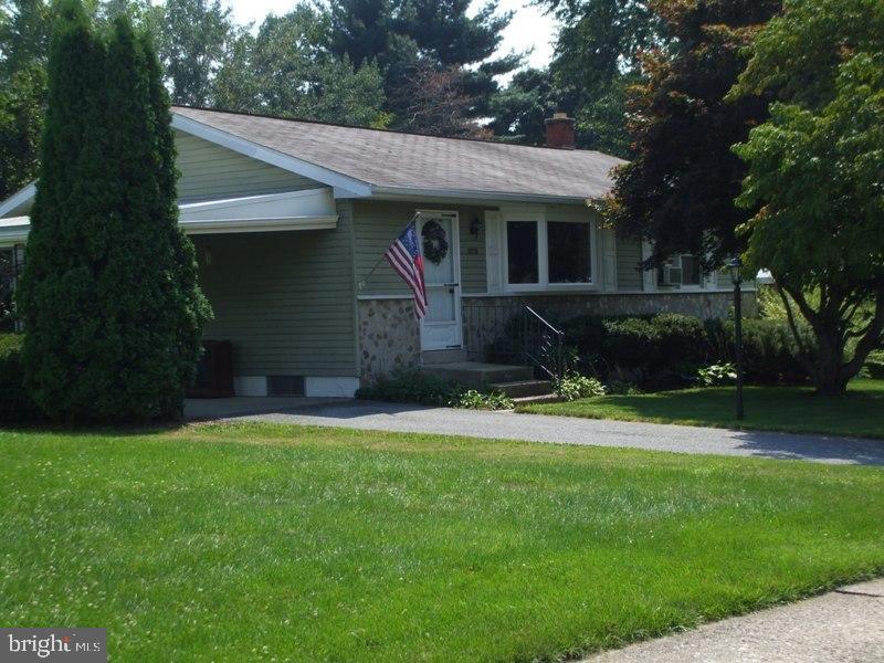 2738 Chapel Road Lancaster, PA 17603 - Photo 2 of 14 front view of a house with a yard