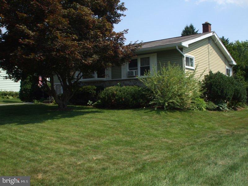 2738 Chapel Road Lancaster, PA 17603 - Photo 3 of 14 a front view of a house with garden