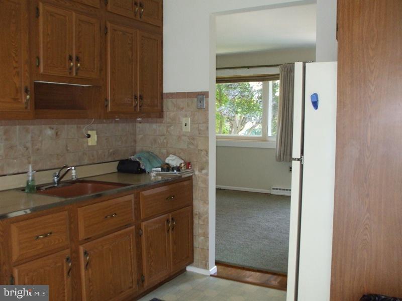 2738 Chapel Road Lancaster, PA 17603 - Photo 10 of 14 a kitchen with a sink and cabinets