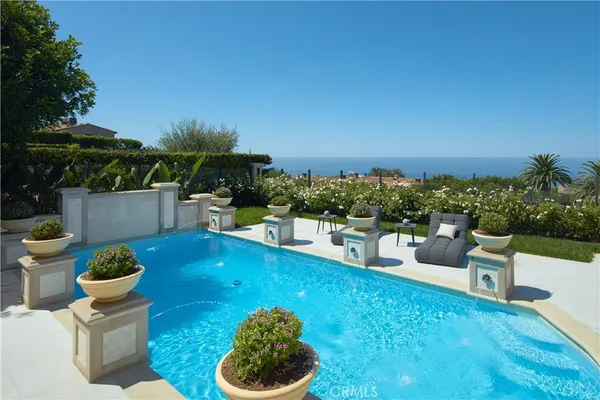 a bathroom with a double vanity sink and mirror