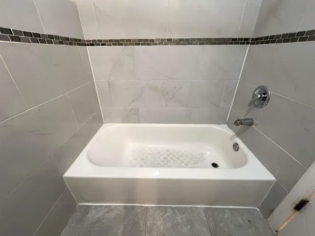 a bathroom with a bathtub