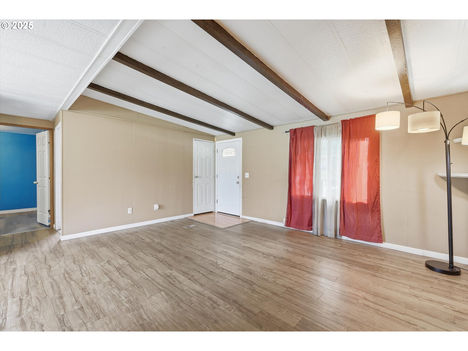 23200 Northeast Sandy Boulevard, Unit 77 Troutdale, OR 97060 - Photo 14 of 43 a view of a room with wooden floor