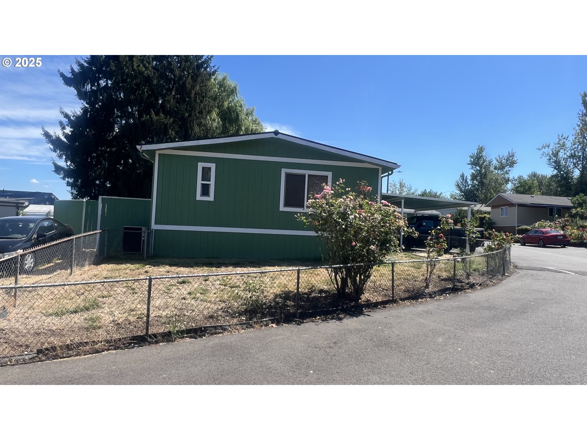 23200 Northeast Sandy Boulevard, Unit 77 Troutdale, OR 97060 - Photo 2 of 43 a black and white photo of a house