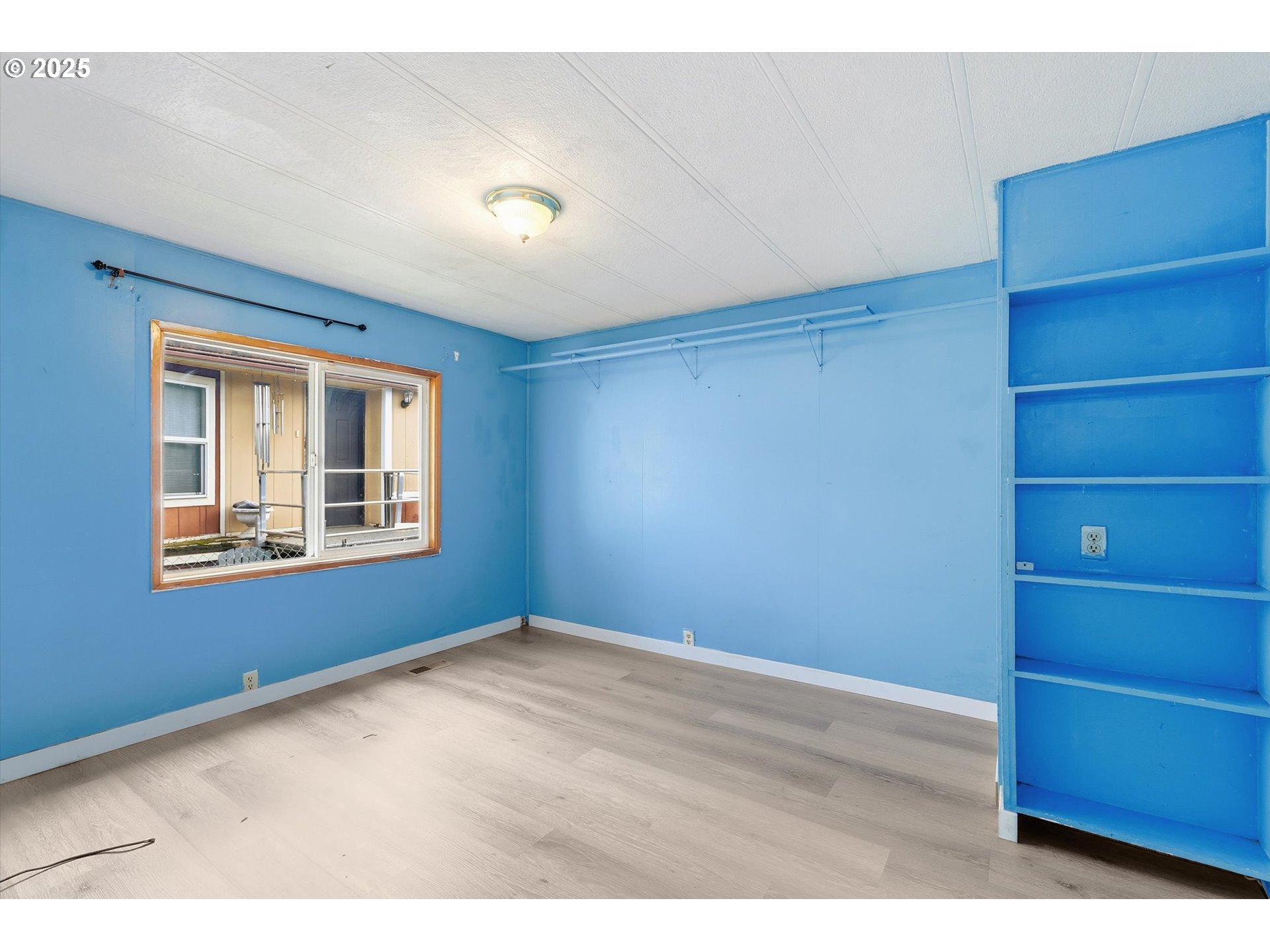 23200 Northeast Sandy Boulevard, Unit 77 Troutdale, OR 97060 - Photo 23 of 43 a view of an empty room with a window