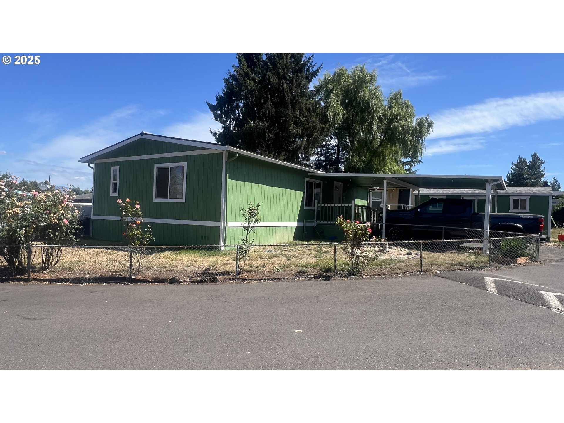 23200 Northeast Sandy Boulevard, Unit 77 Troutdale, OR 97060 - Photo 3 of 43 a black and white photo of a house