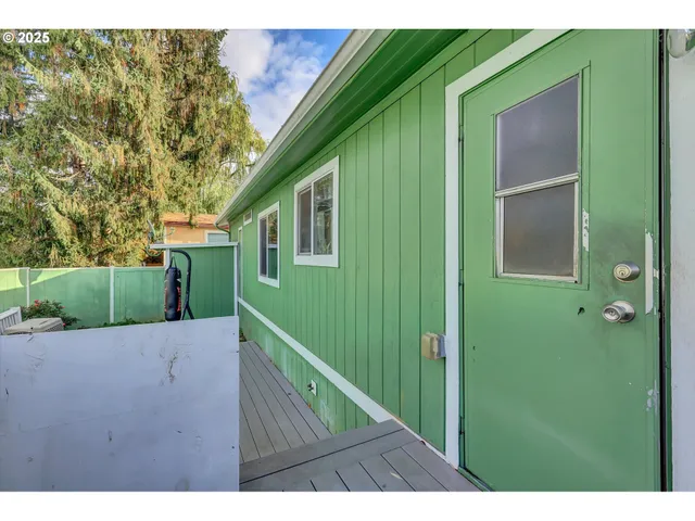 a view of backyard with green space