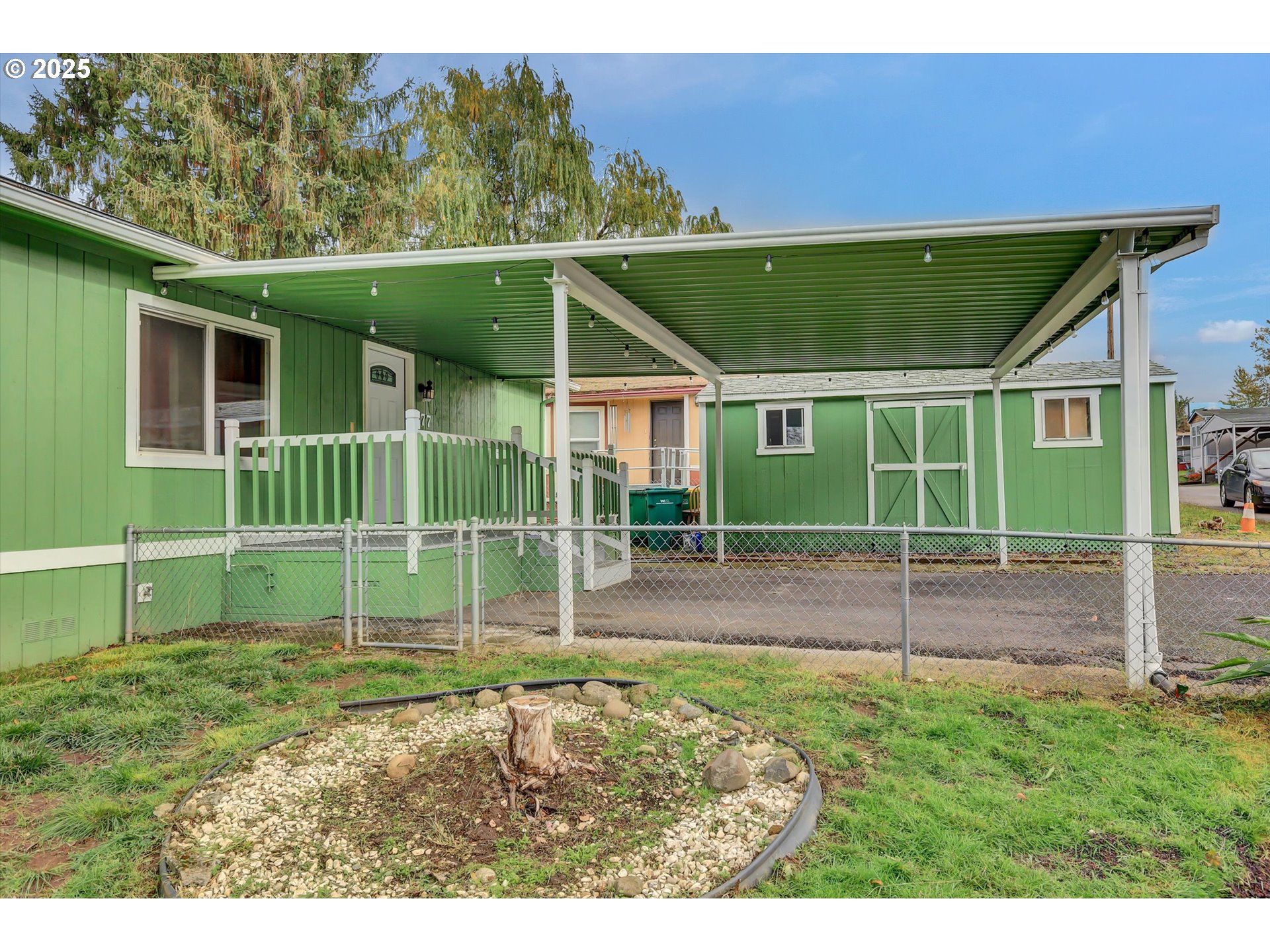 23200 Northeast Sandy Boulevard, Unit 77 Troutdale, OR 97060 - Photo 10 of 43 a house view with a backyard space