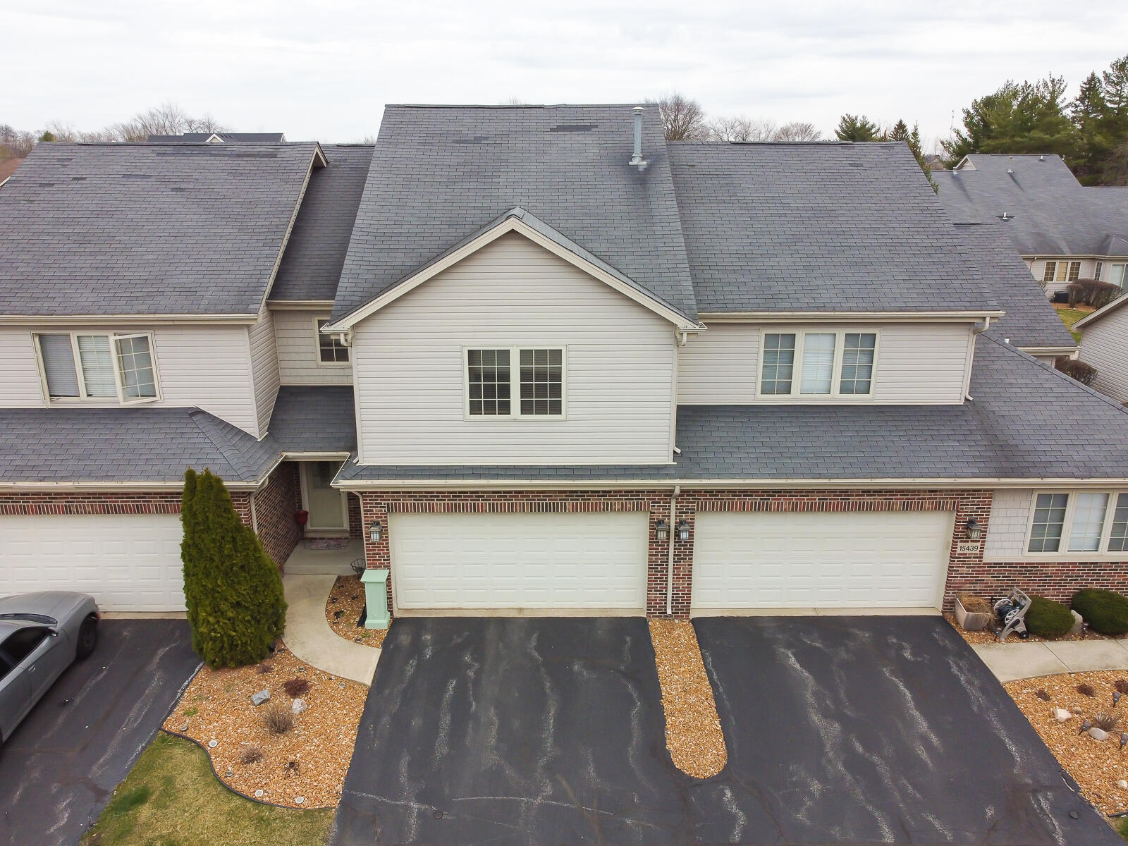 15437 98th Place Dyer, IN 46311 - Photo 2 of 19 a front view of a house with parking space