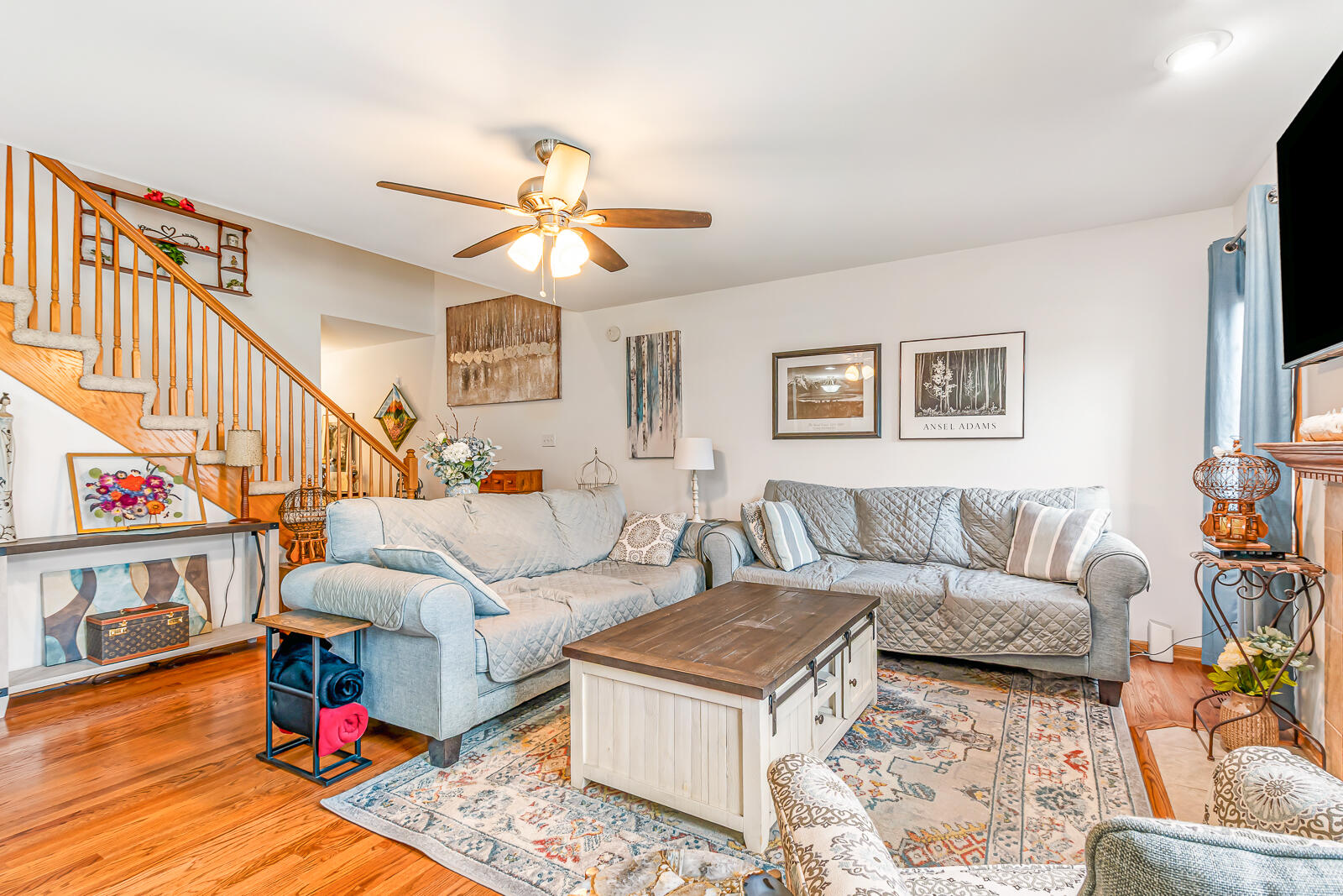 15437 98th Place Dyer, IN 46311 - Photo 4 of 19 a living room with furniture a couch and a chandelier