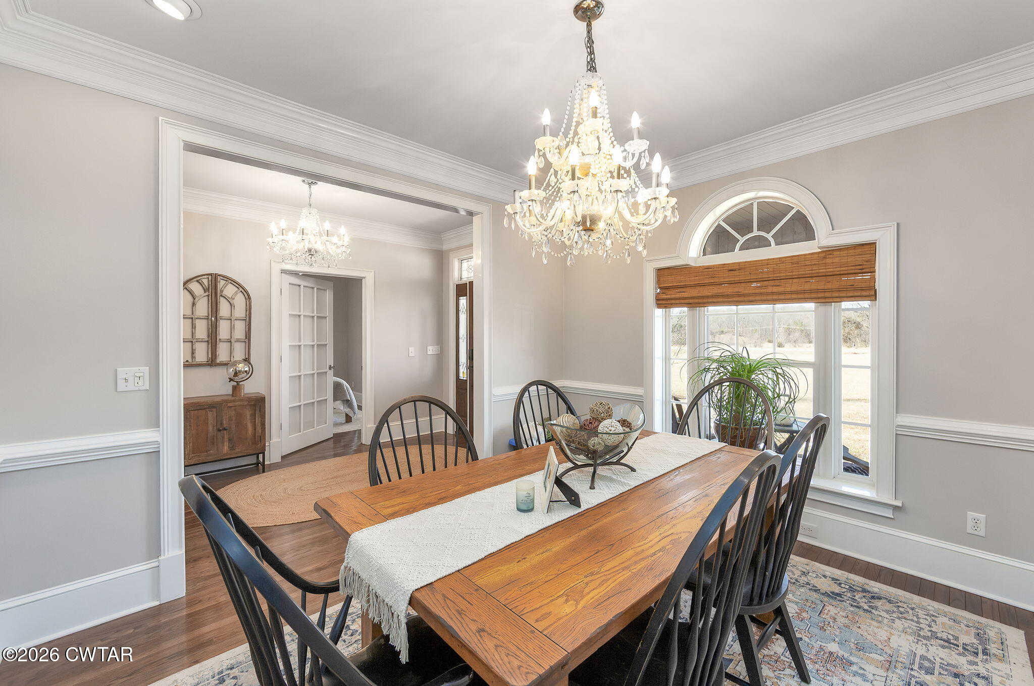 4320 Timberlake-Wildersville Road Lexington, TN 38351 - Photo 9 of 58 a view of a dining room with furniture a chandelier and wooden floor