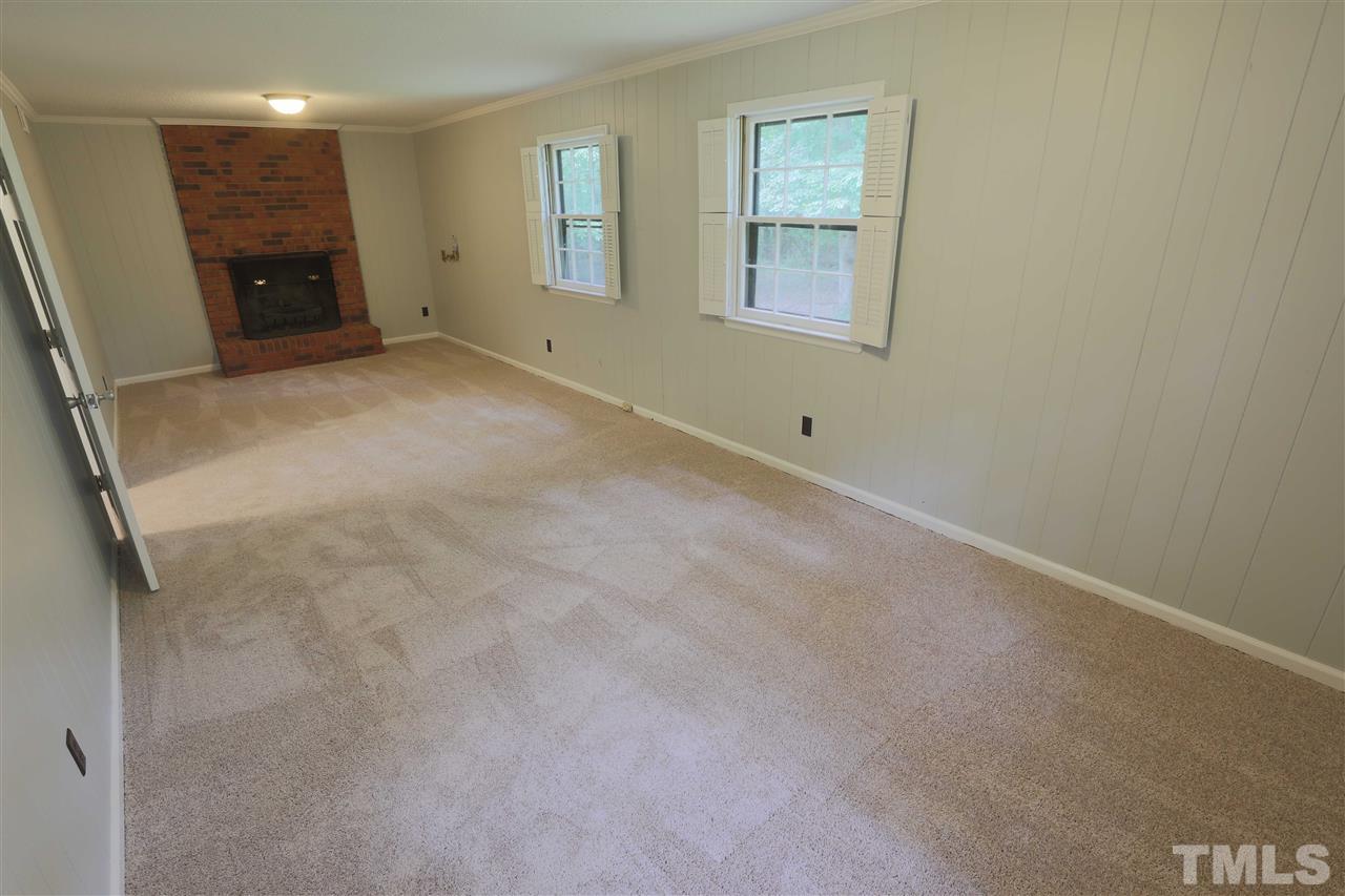 1609 Baker Road Raleigh, NC 27607 - Photo 14 of 22 an empty room with windows