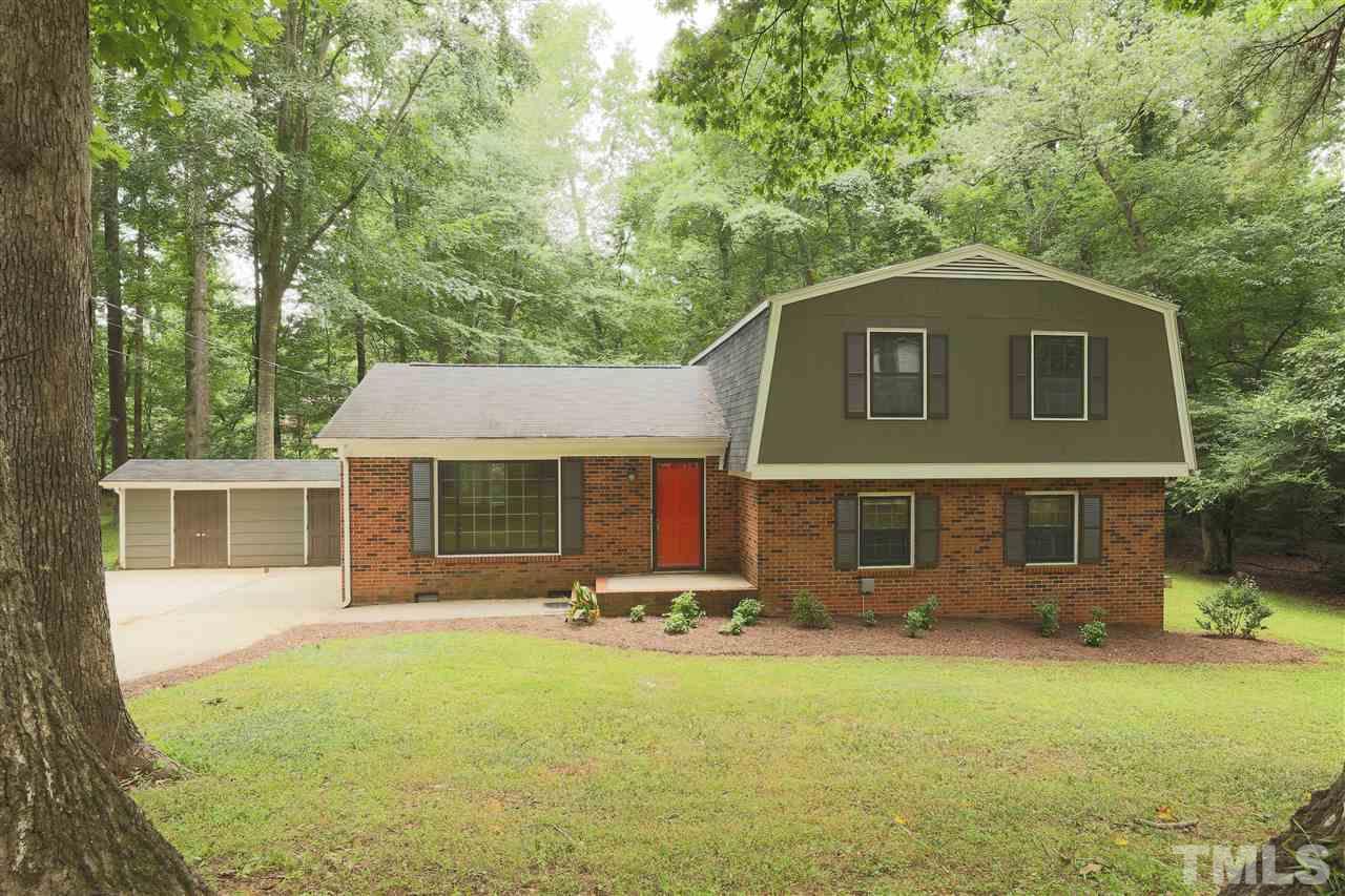 1609 Baker Road Raleigh, NC 27607 - Photo 3 of 22 front view of a house with a yard