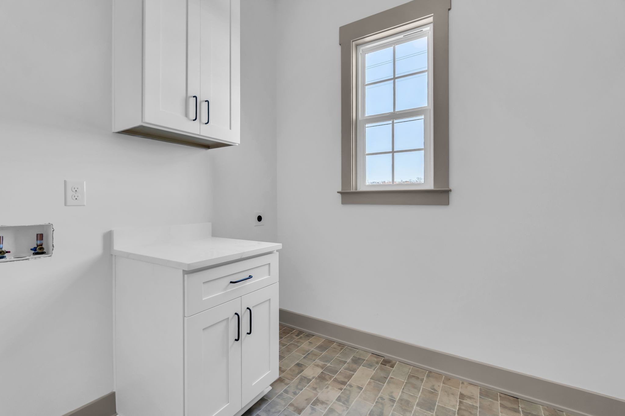 5414 Old Salem Road Rockvale, TN 37153 - Photo 14 of 34 a kitchen with white cabinets and a window