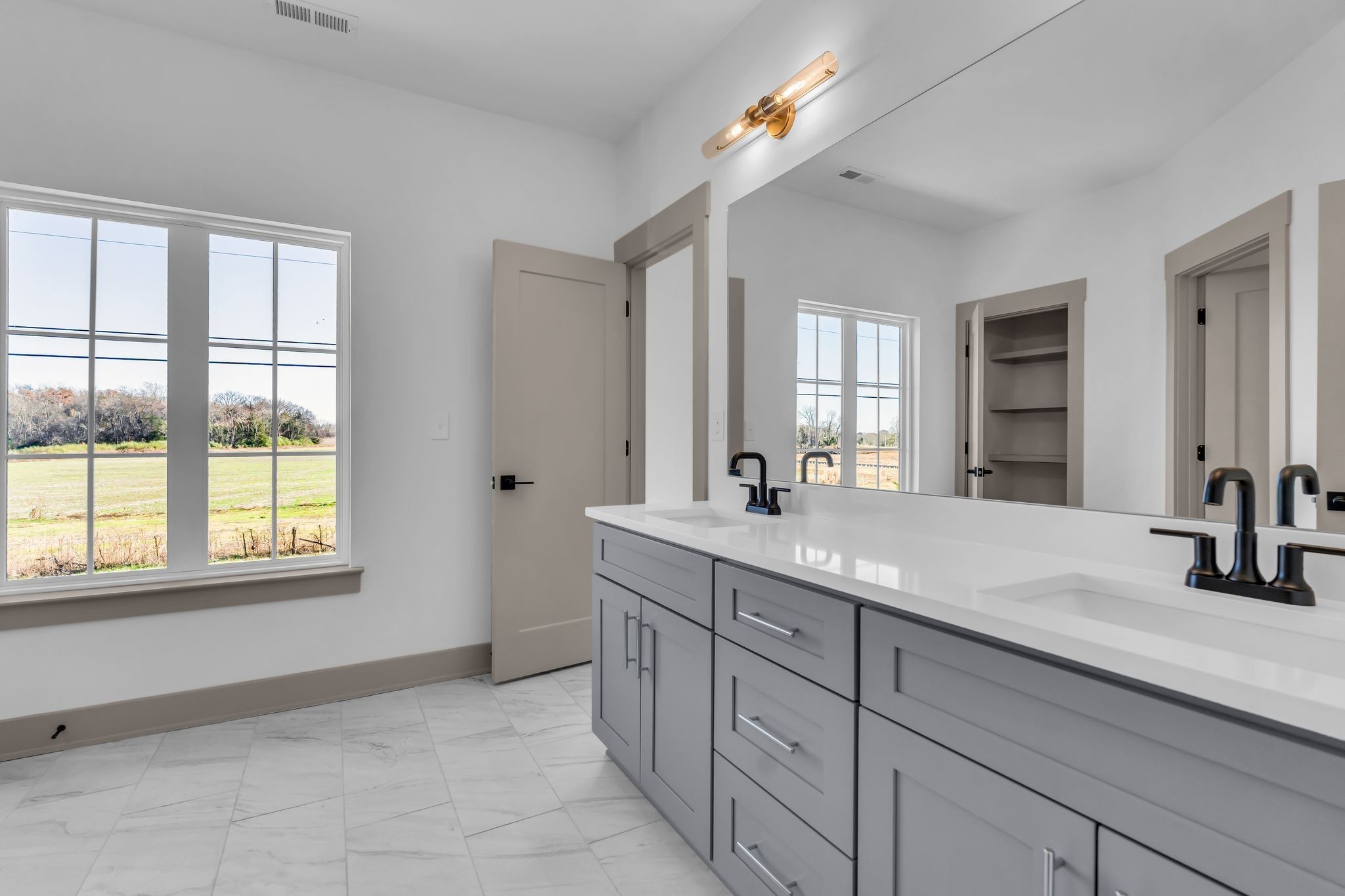 5414 Old Salem Road Rockvale, TN 37153 - Photo 28 of 34 a bathroom with a sink double vanity granite tub and a mirror