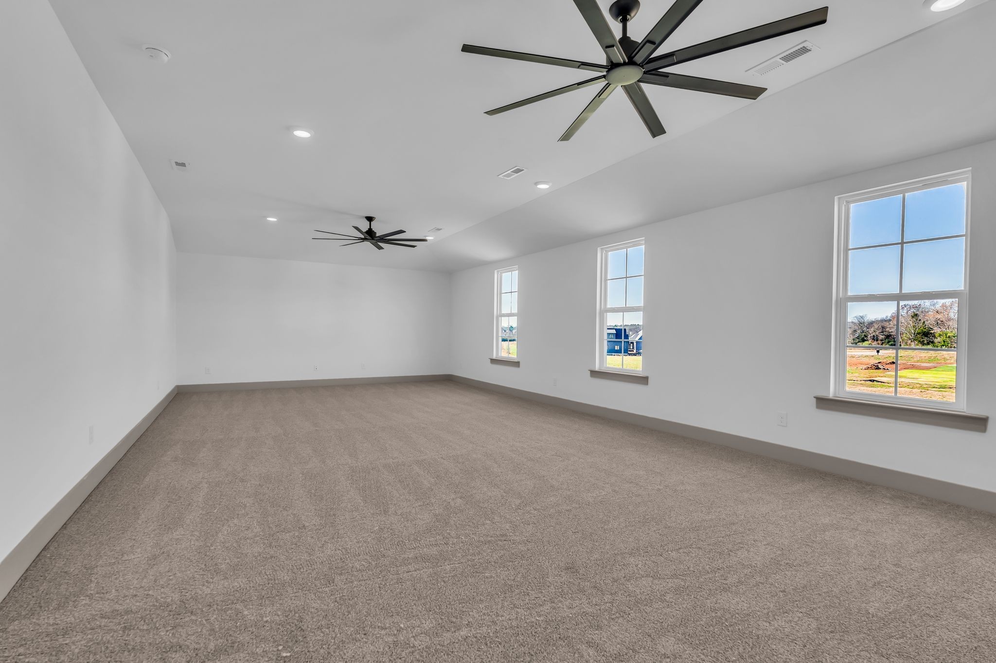 5414 Old Salem Road Rockvale, TN 37153 - Photo 30 of 34 an empty room with chandelier fan and windows