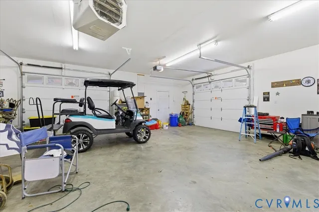 a view of a garage with parked cars
