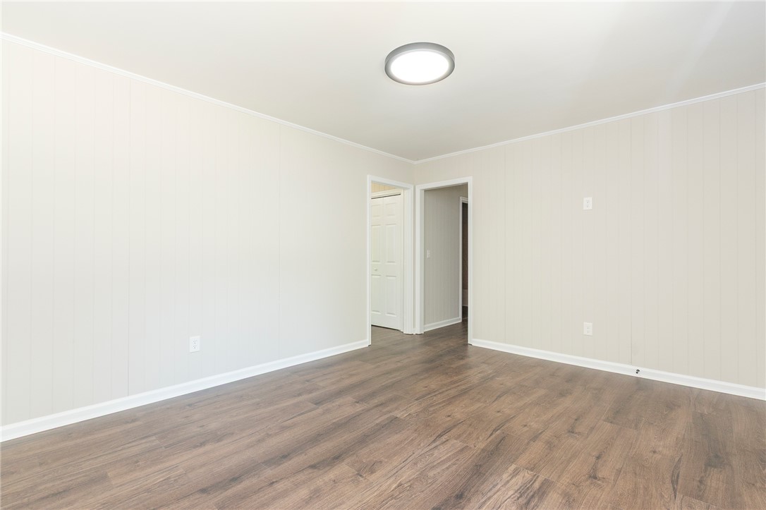 113 Linda Lane Honea Path, SC 29654 - Photo 9 of 36 This bright room features beautiful wood flooring, offering a versatile space for any design.